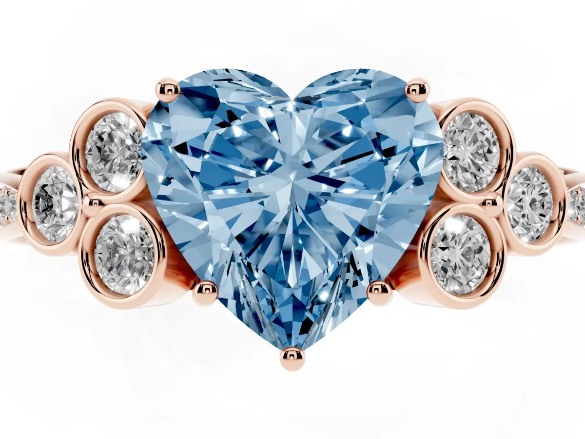 Fancy Blue Heart Cut Cut Diamond Engagement Ring with Bezel Set Round Side Stones and Prong Setting Rose gold