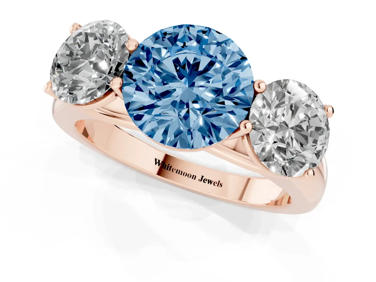 Fancy Blue Round Cut Three-Stone Diamond Ring with Prong Setting on a Classic Band Rose gold