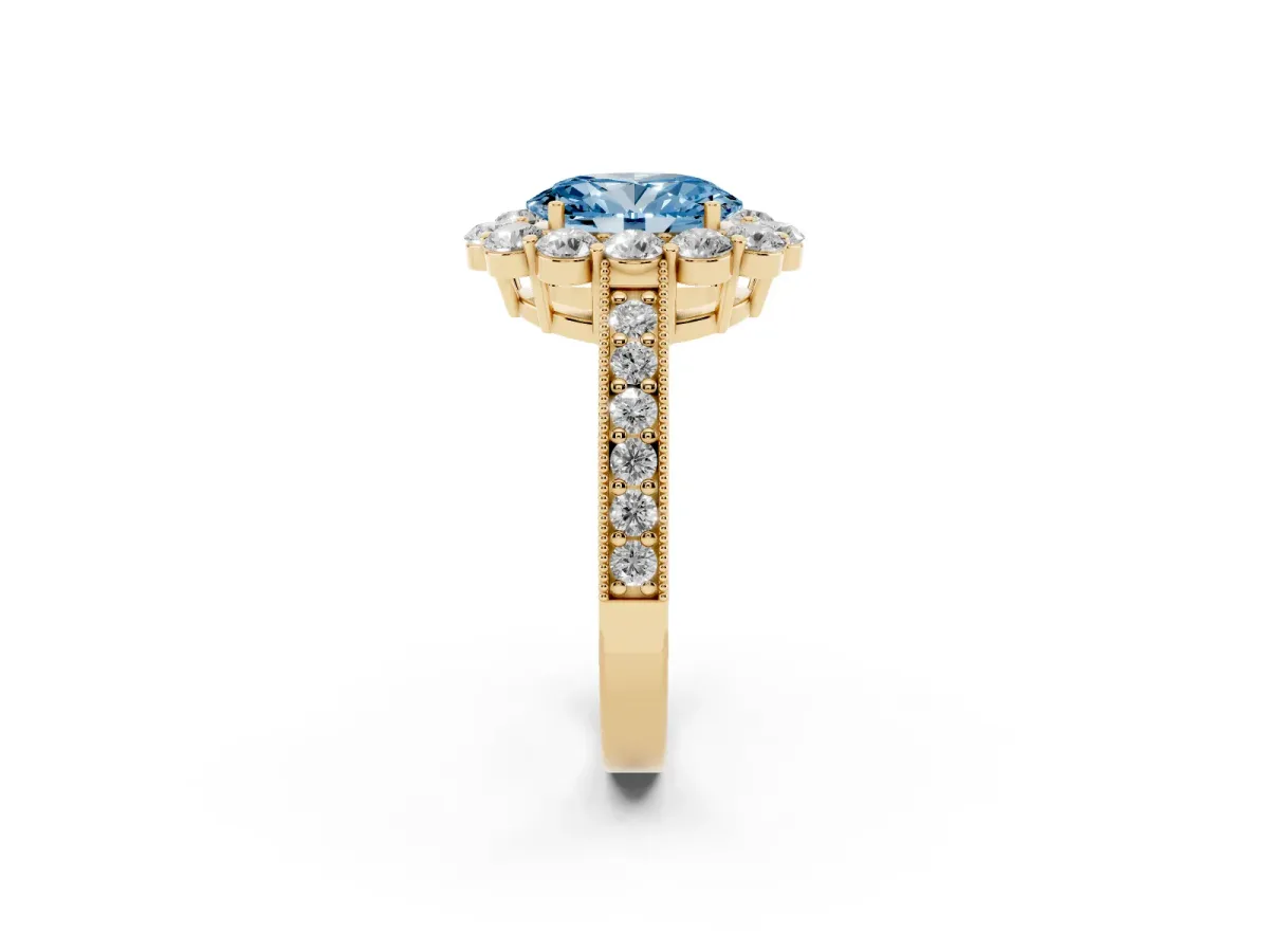 Fancy Blue Oval Cut Cut Halo Diamond Pavé Engagement Ring with Milgrain Detailing Yellow gold