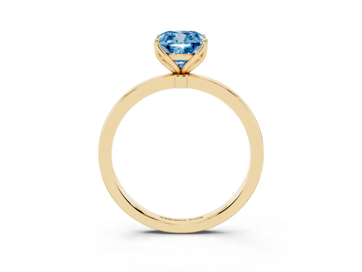 Fancy Blue Cushion Cut Diamond Solitaire Ring with Thin Band and Prong Setting Yellow gold