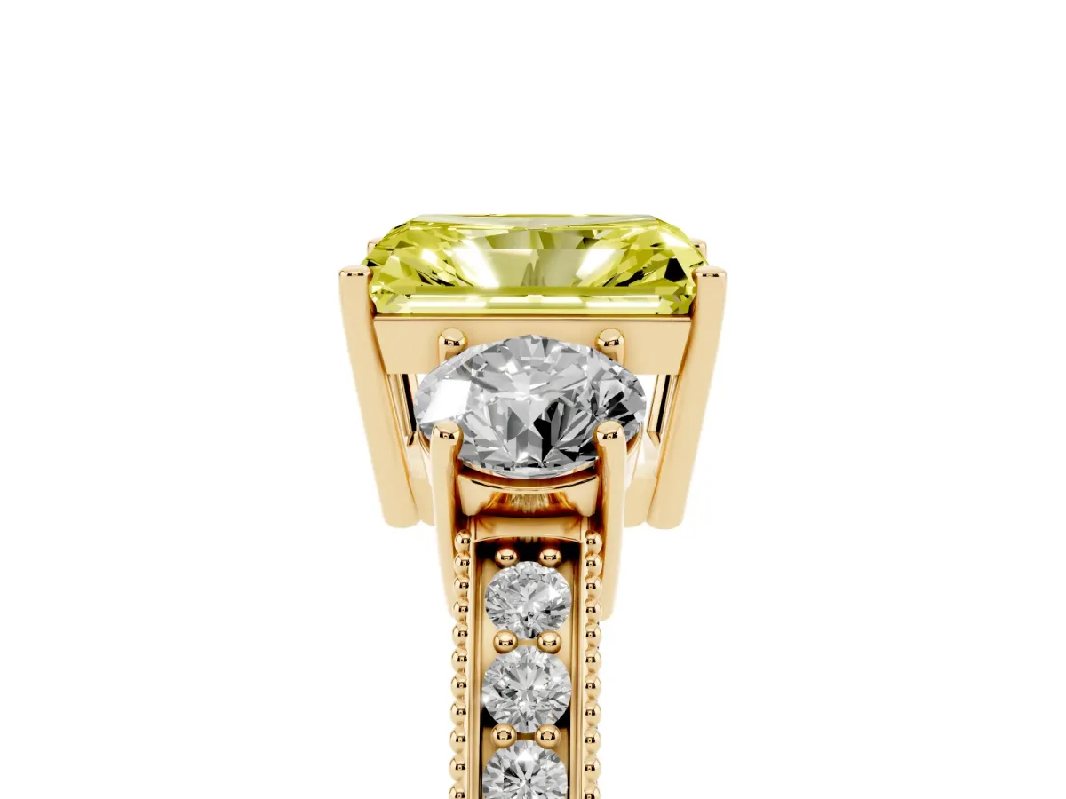 Fancy Yellow Radiant Cut Three-Stone Diamond Ring with Pavé Band and Four-Prong Setting Yellow gold