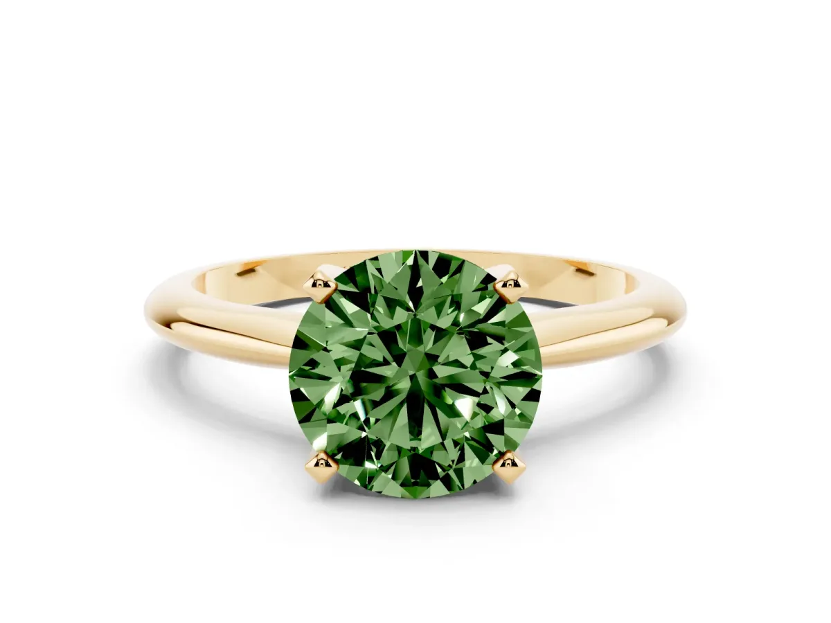Fancy Green Round Cut Cut Solitaire Ring with Four-Prong Setting on a Classic Band Yellow gold