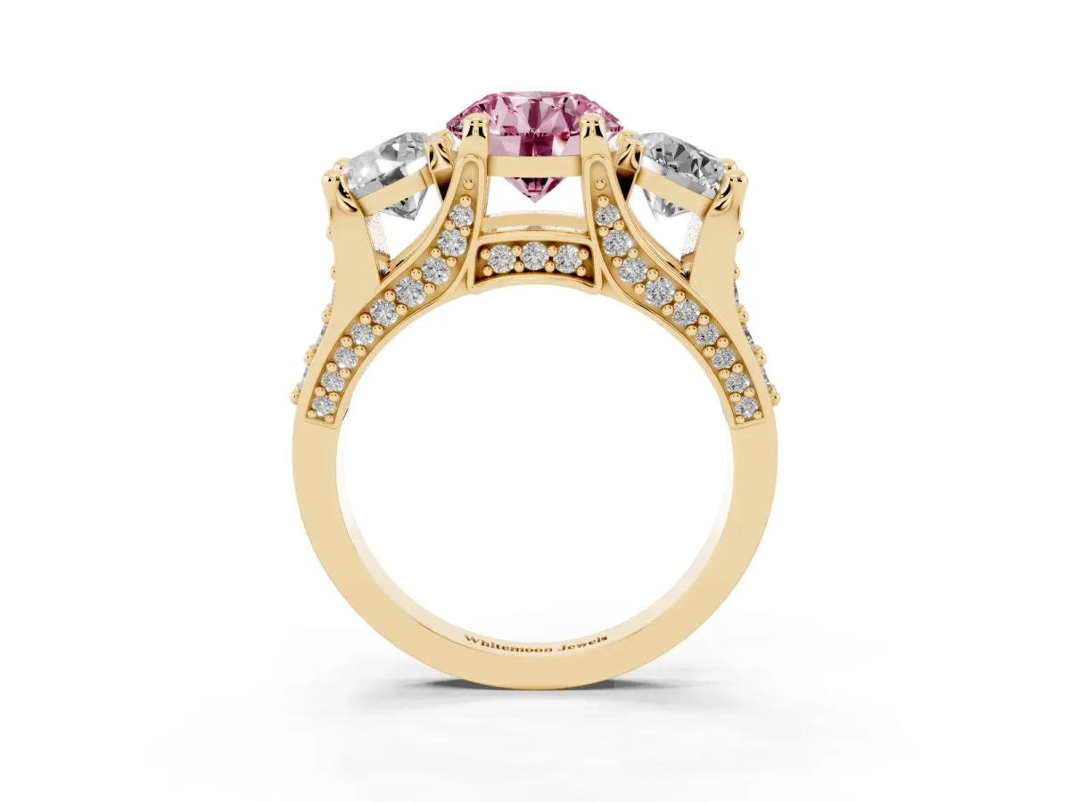 Fancy Pink Round Cut Diamond Three-Stone Ring with Channel Set Band and Four-Prong Setting Yellow gold