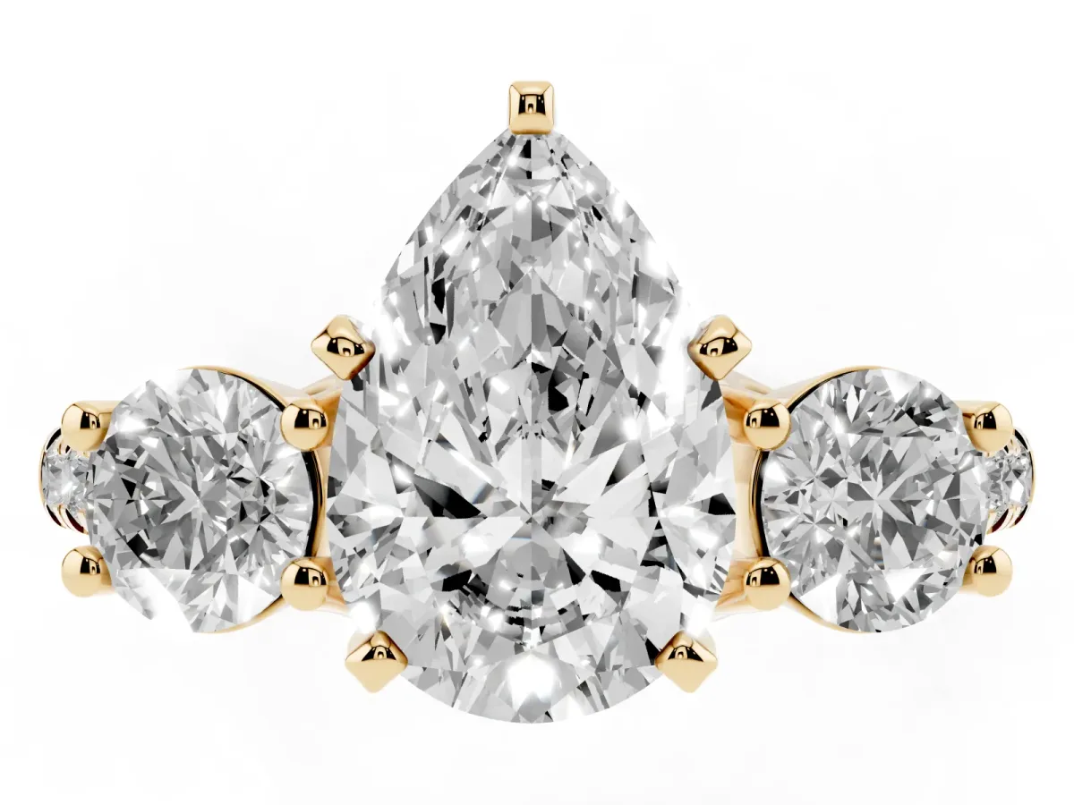 Three-Stone Pear Cut Diamond Pavé Band with Four-Prong Setting Yellow gold