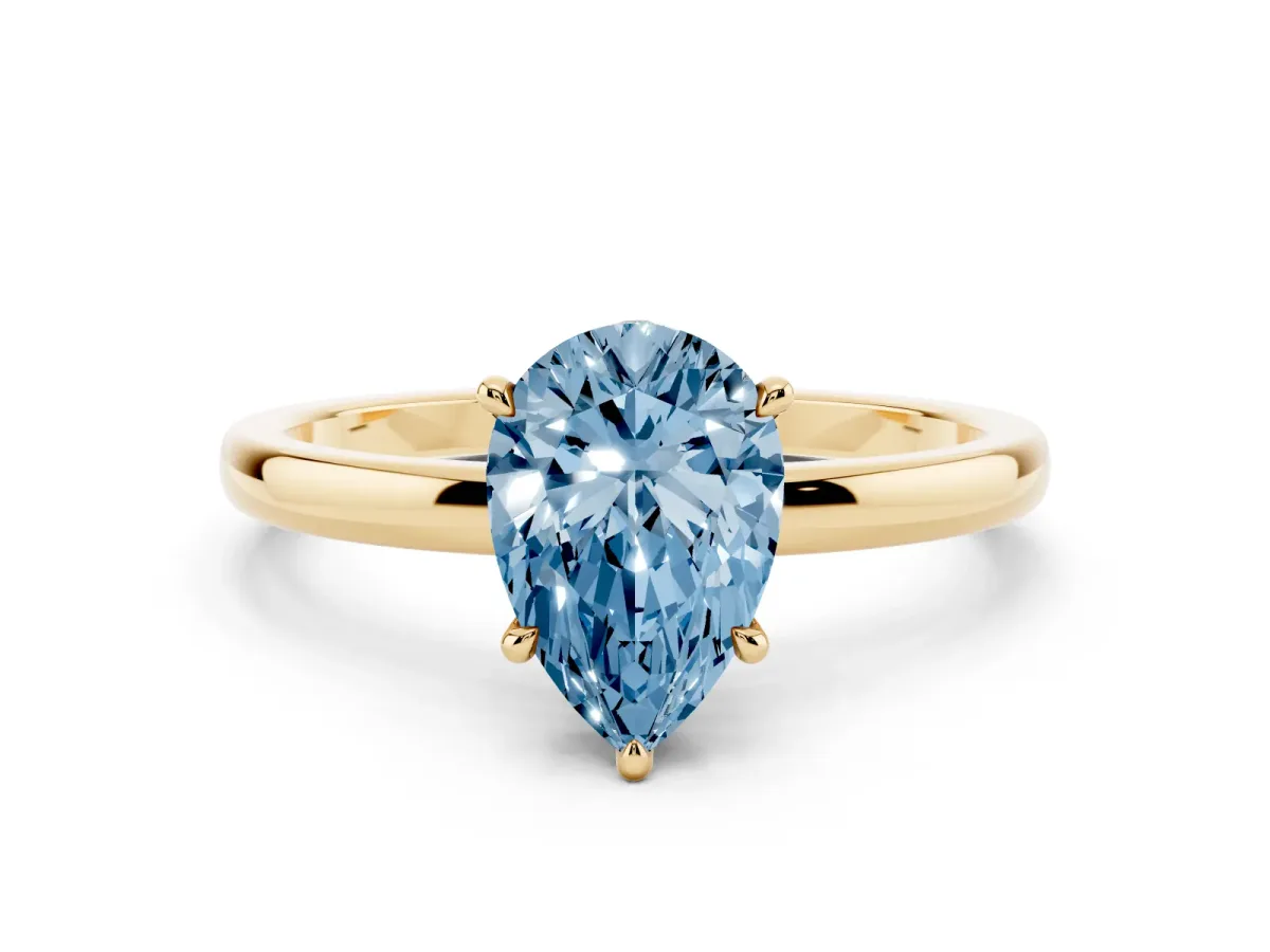 Fancy Blue Pear Cut Solitaire Engagement Ring with Cathedral Band and Four-Prong Setting Yellow gold