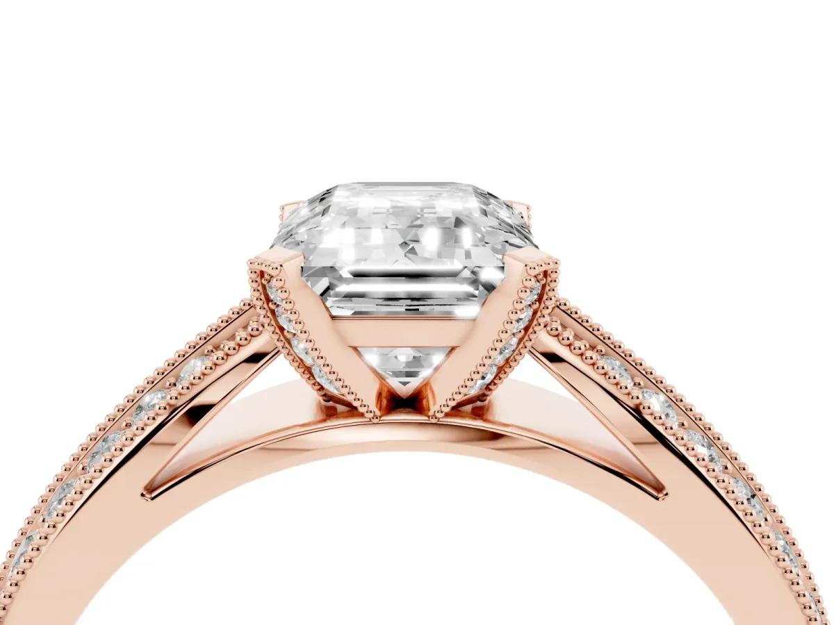 Emerald Cut Diamond Solitaire Ring with Milgrain Round Pavé Band and Prong Setting Rose gold