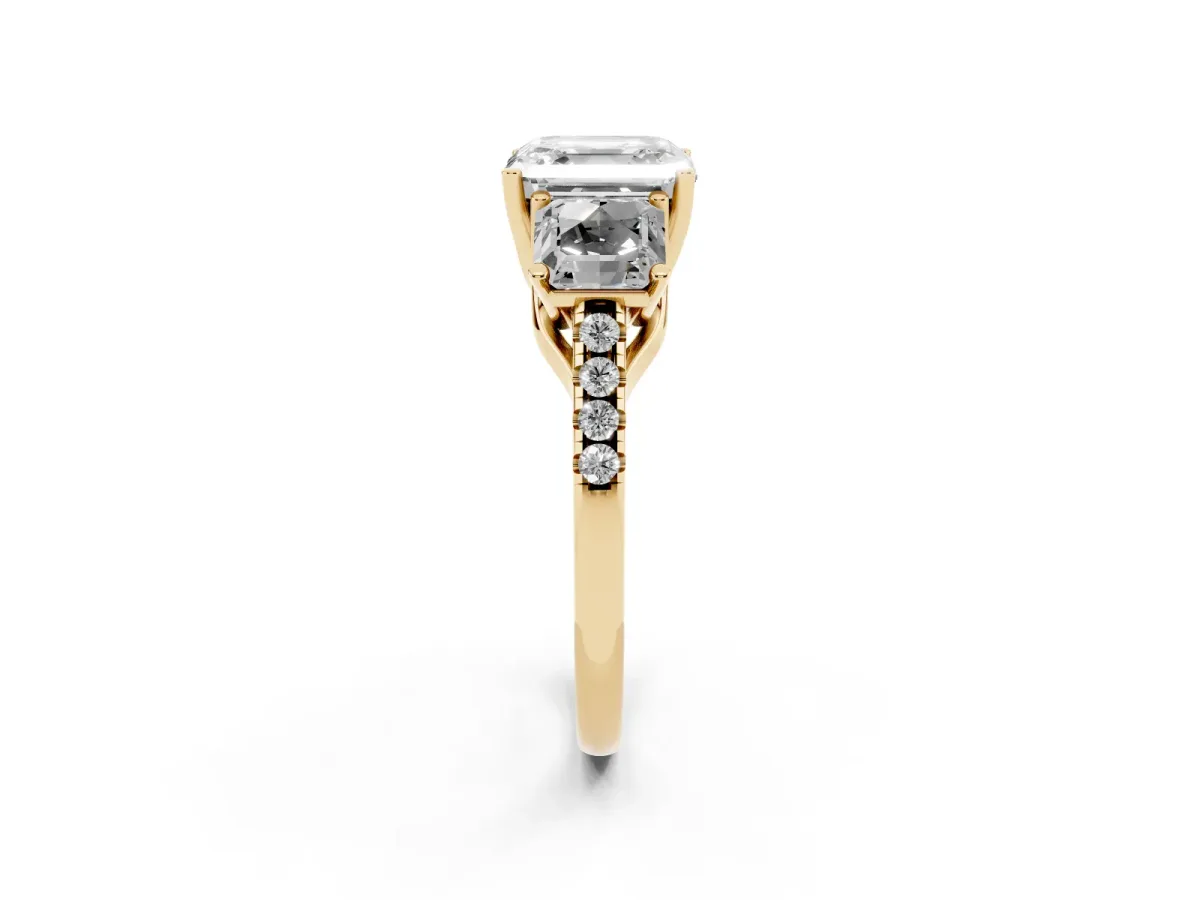 Three-Stone Asscher Cut Diamond Ring with Round Pavé Band and Prong Setting Yellow gold