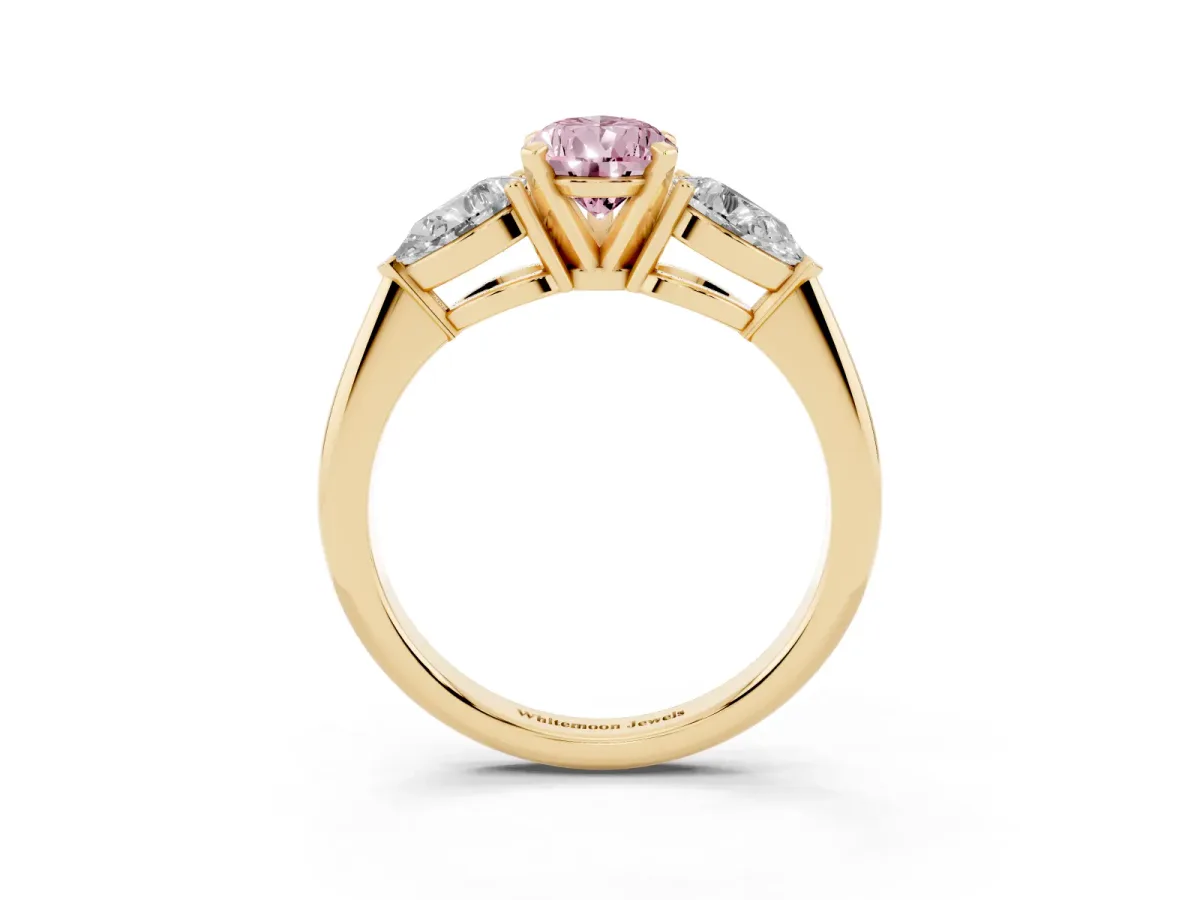 Fancy Pink Three-Stone Pear Cut Diamond Ring with Pear Side Stones and Four-Prong Setting Yellow gold