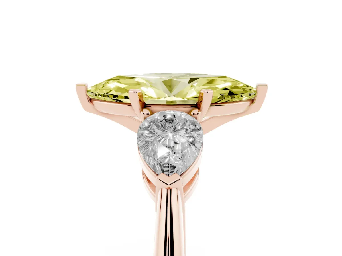 Fancy Yellow Three-Stone Marquise Cut Diamond Ring with Pear Side Stones and Four-Prong Setting Rose gold