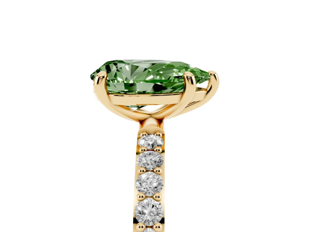 Fancy Green Pear Cut Diamond Solitaire Ring with Round Pavé Band and Prong Setting Yellow gold