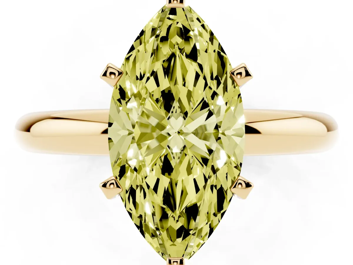 Fancy Yellow Marquise Cut Diamond Solitaire Engagement Ring with Round Band and Four-Prong Setting Yellow gold