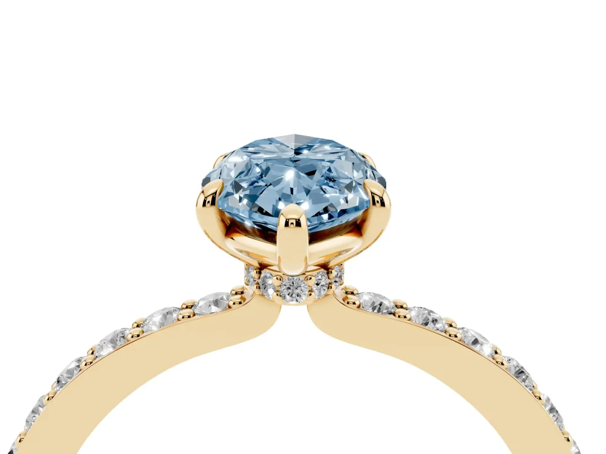 Fancy Blue Marquise Cut Diamond Pavé Engagement Ring with Round Accents and Prong Setting Yellow gold