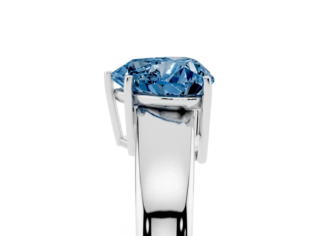 Fancy Blue Heart Cut Solitaire Diamond Ring with Tapered Band and Four-Prong Setting White gold
