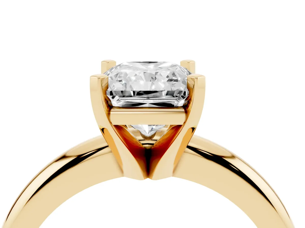 Radiant Cut Diamond Solitaire Engagement Ring with Round Band and Four-Prong Setting Yellow gold