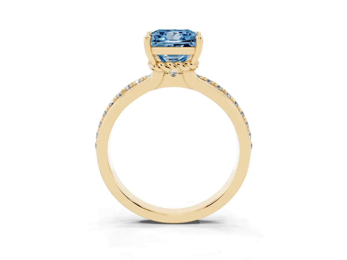 Fancy Blue Princess Cut Solitaire Diamond Ring with Channel Set Band and Six-Prong Setting Yellow gold