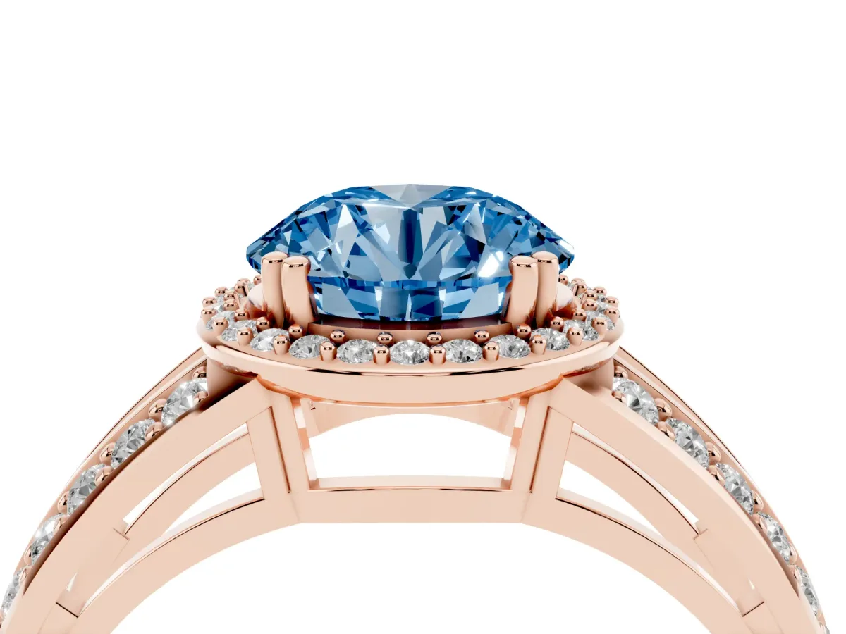 Fancy Blue Round Cut Diamond Halo Ring with Split Shank Pavé Band and Four-Prong Setting Rose gold