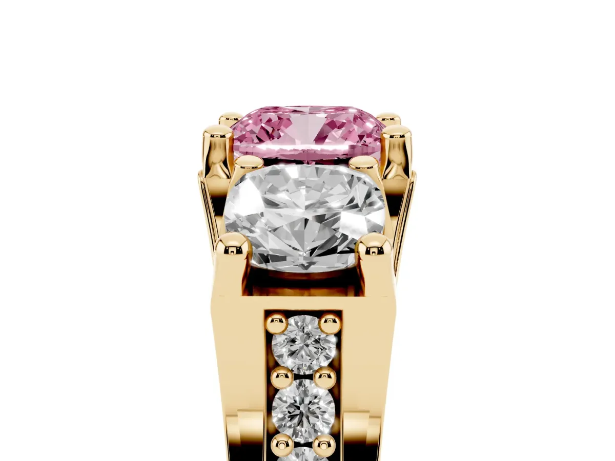 Fancy Pink Cushion Cut Diamond Three-Stone Ring with Channel Set Band and Four-Prong Setting Yellow gold