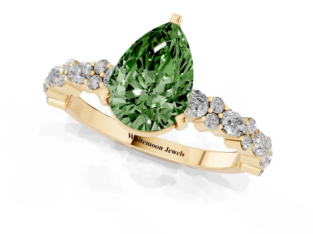 Fancy Green Pear Cut Diamond Side Stone Solitaire Ring with Round and Four-Prong Setting Yellow gold
