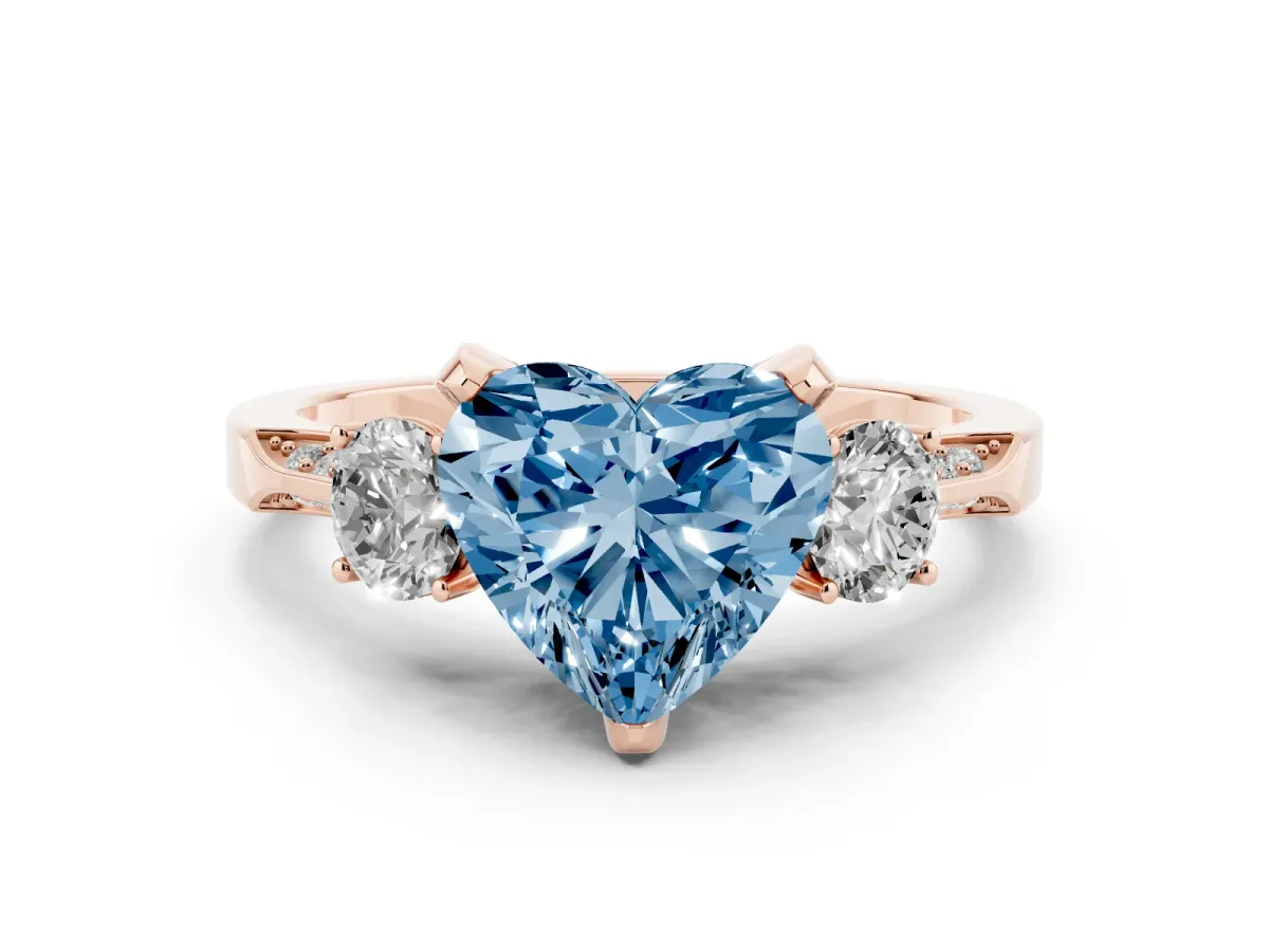 Fancy Blue Heart Cut Brilliant Three-Stone Diamond Ring with Pavé Band and Four-Prong Setting Rose gold