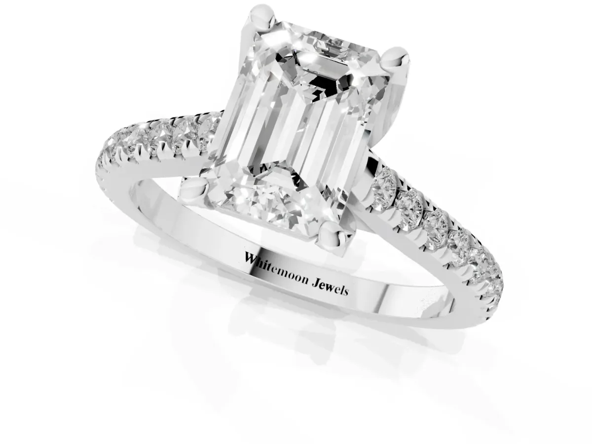 Emerald Cut Brilliant Diamond Solitaire with Pavé Band and Four-Prong Setting Silver