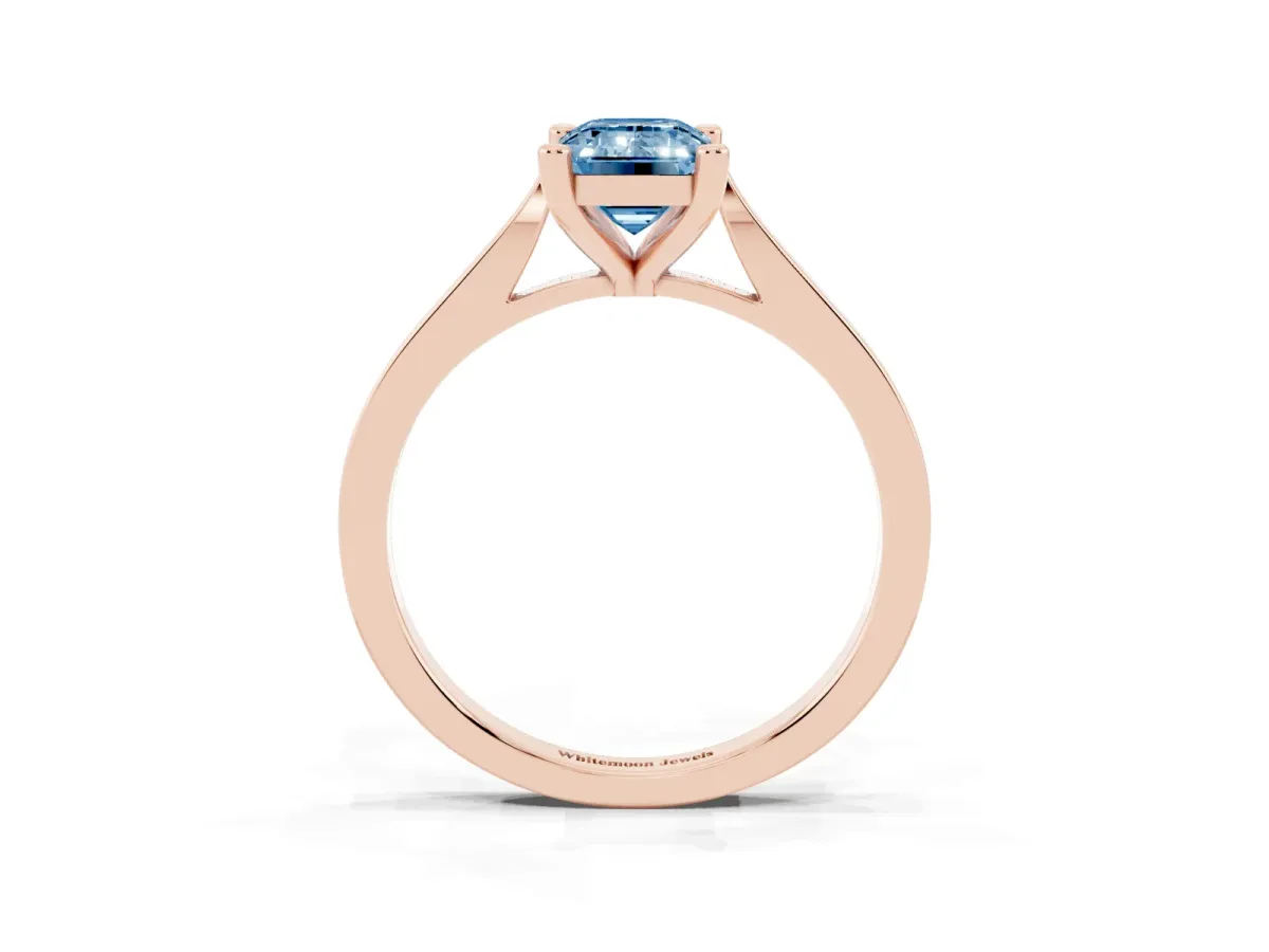 Fancy Blue Emerald Cut Solitaire Diamond Ring with Four-Prong Setting and Tapered Band Rose gold