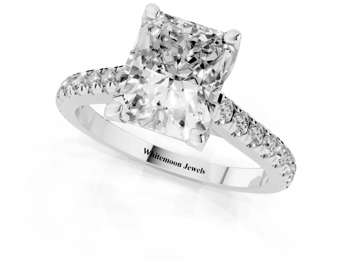 Radiant Cut Brilliant Diamond Solitaire with Pavé Band and Four-Prong Setting White gold