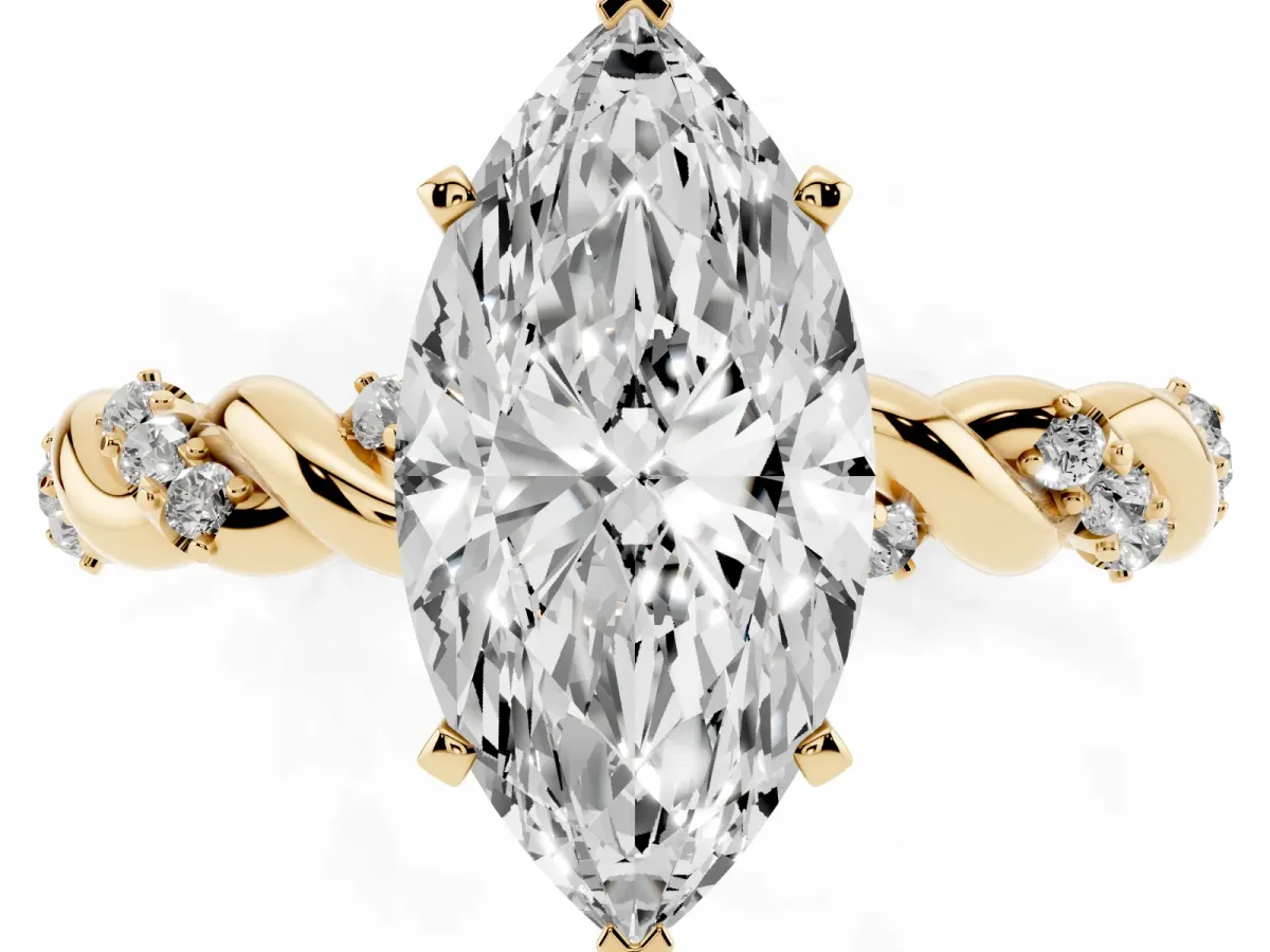 Marquise Cut Diamond Solitaire Ring with Twisted Band and Pavé Accents Yellow gold