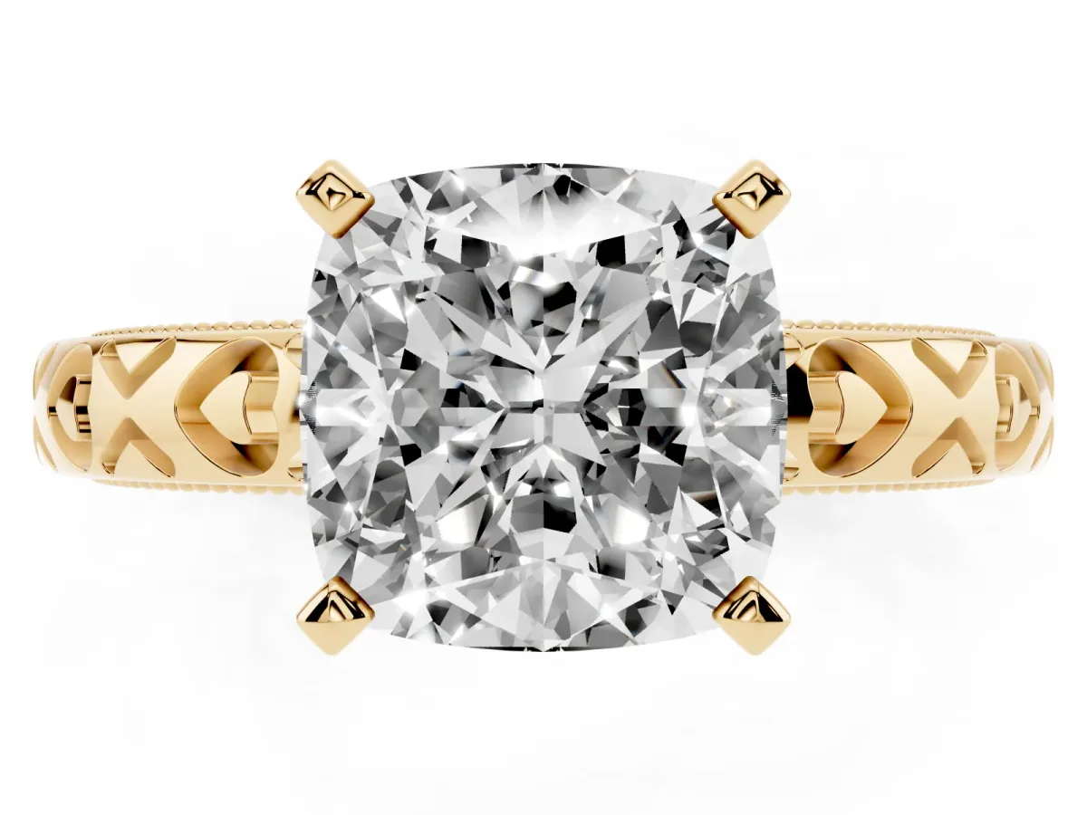 Cushion Cut Solitaire Diamond Engagement Ring with XO Engraved Band and Four-Prong Setting Yellow gold