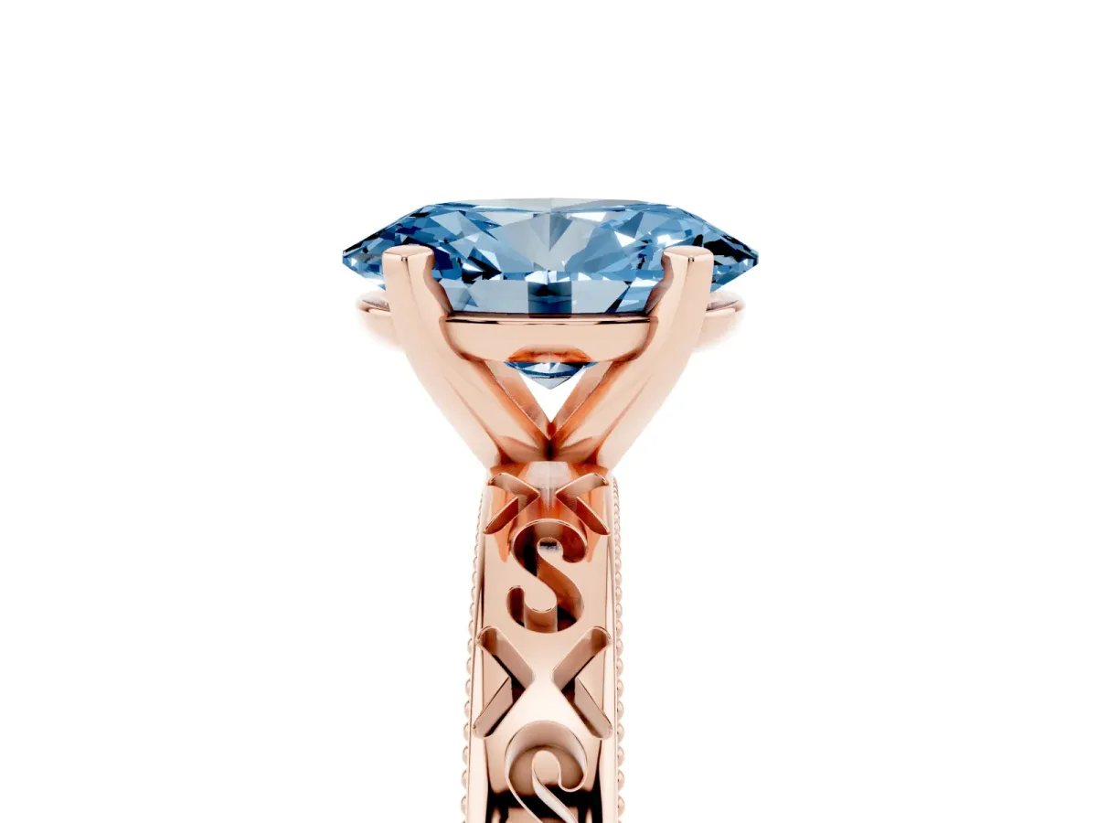 Fancy Blue Oval Cut Solitaire Engagement Ring with Scrollwork Band and Four-Prong Setting Rose gold