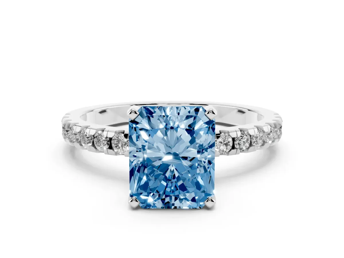 Fancy Blue Radiant Cut Diamond Solitaire Ring with Round Pavé Band and Four-Prong Setting Silver