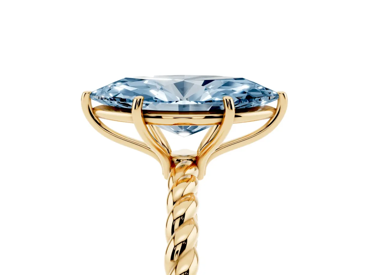 Fancy Blue Marquise Cut Solitaire Twist Band Ring with Four-Prong Setting Yellow gold