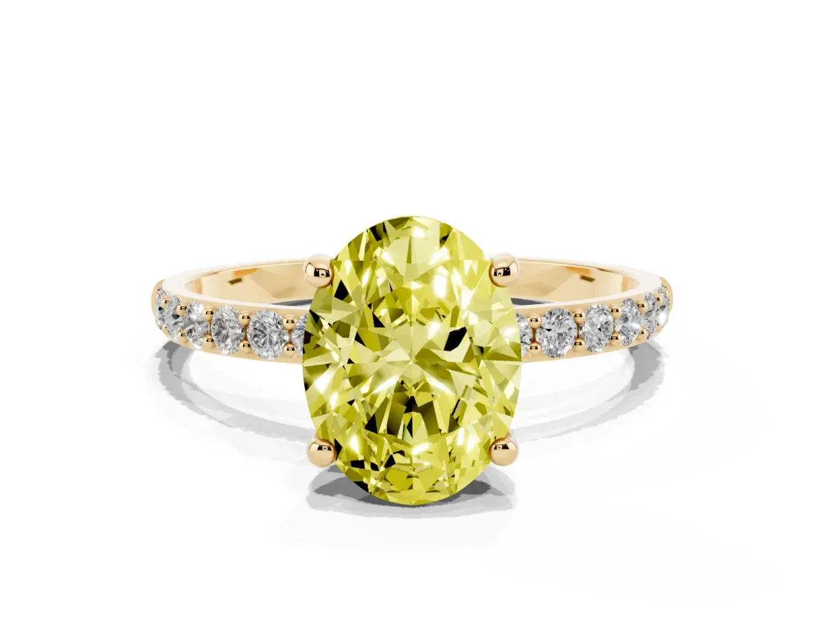 Fancy Yellow Oval Cut Diamond Solitaire Ring with Round Pavé Band and Prong Setting Yellow gold