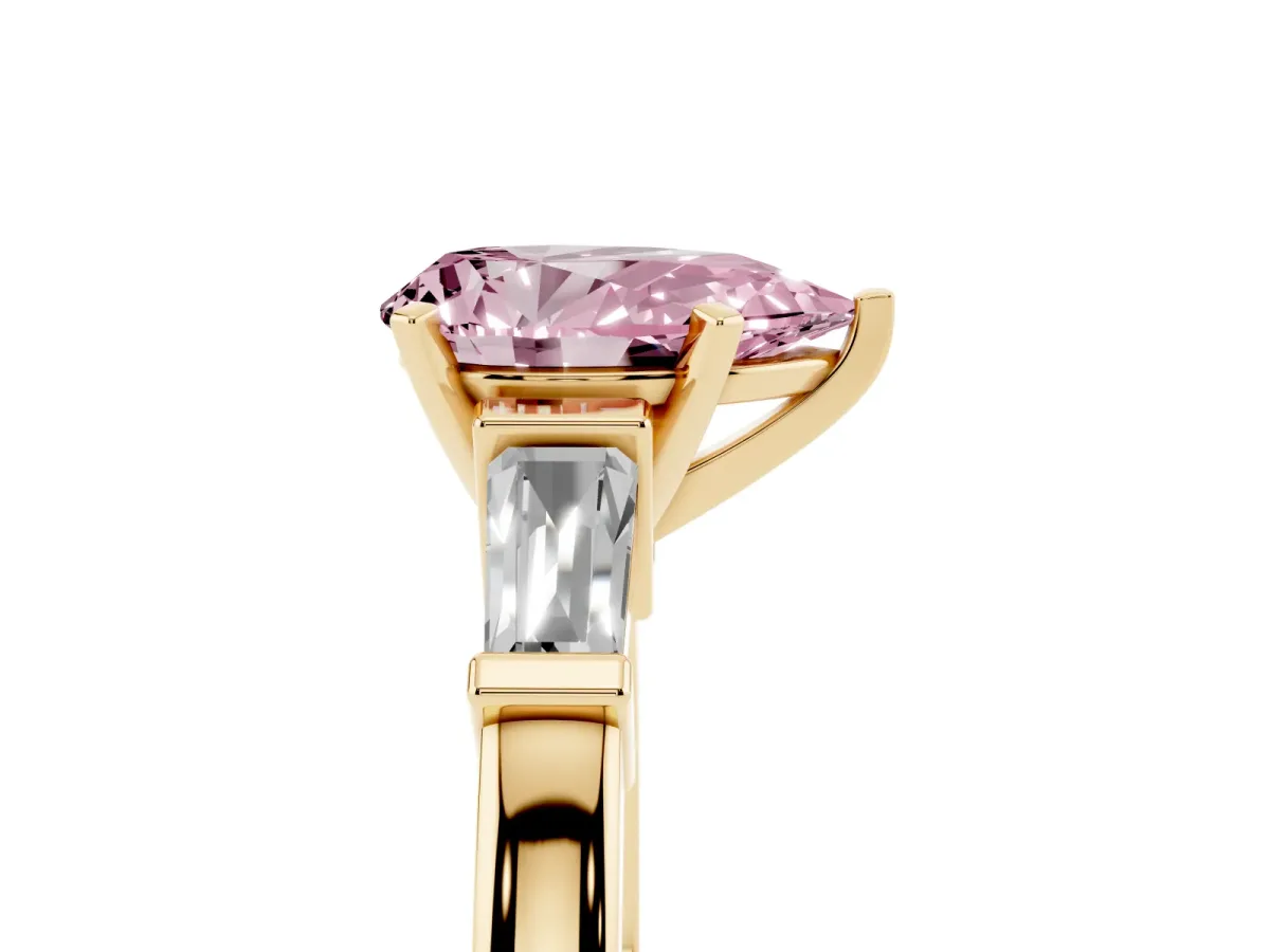 Fancy Pink Pear Cut Cut Diamond Solitaire Ring with Tapered Baguette Accents and Four-Prong Setting Yellow gold