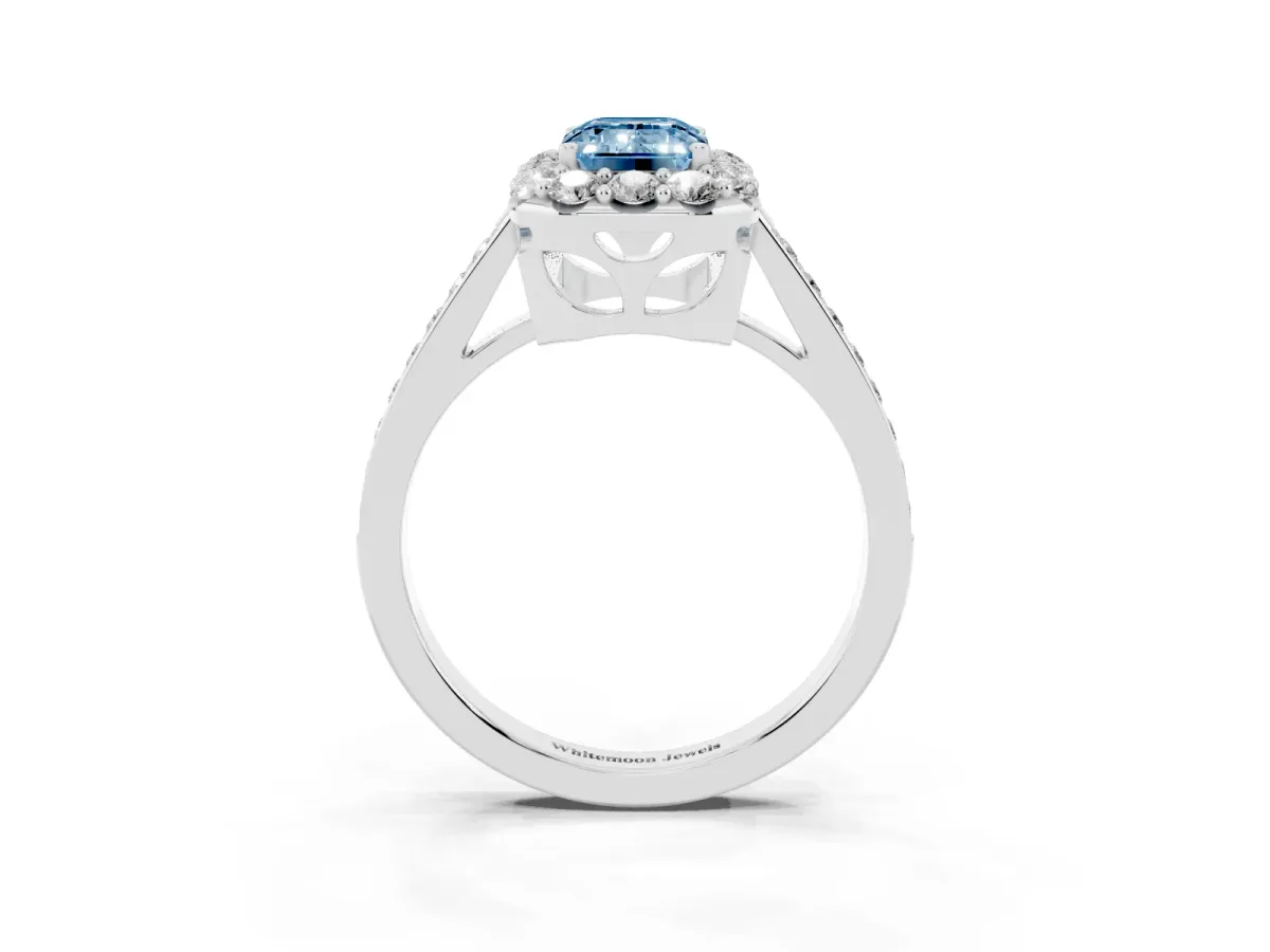 Fancy Blue Emerald Cut Diamond Floral Halo Ring with Pavé Band and Prong Setting White gold