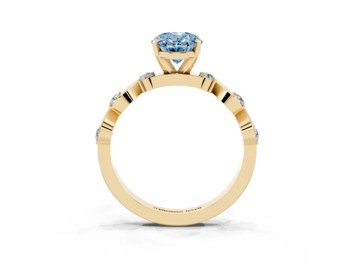 Fancy Blue Oval Cut Diamond Solitaire Twisted Band with Round Accents and Prong Setting Yellow gold