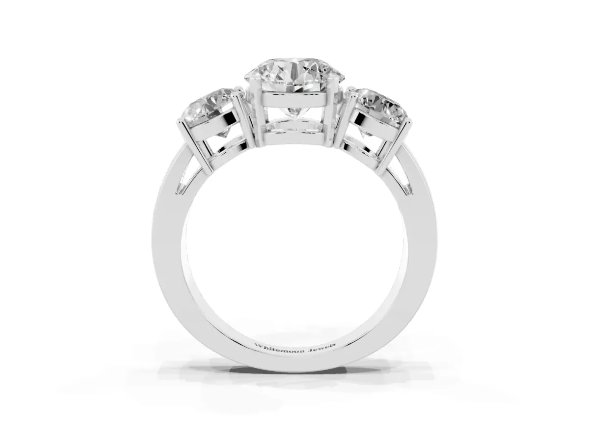 Three-Stone Round Cut Diamond Ring with Round Side Stones, Classic Band, and Four-Prong Setting White gold