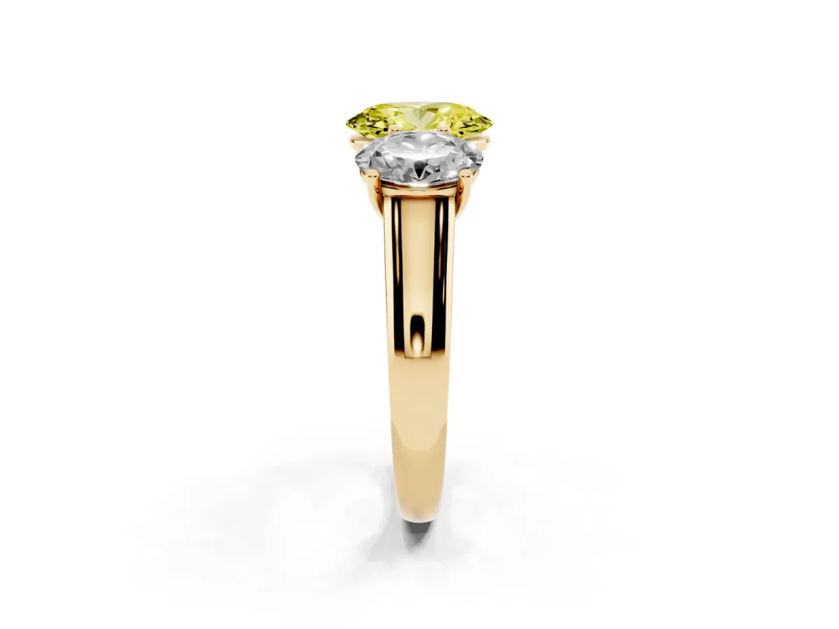 Fancy Yellow Oval Cut Three-Stone Diamond Ring with Prong Setting on a Classic Band Yellow gold
