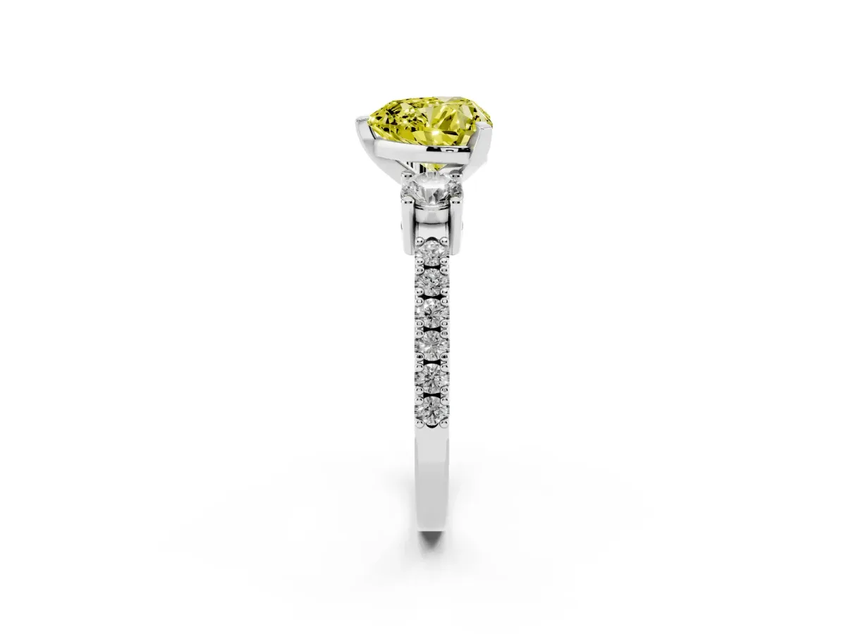 Fancy Yellow Heart Cut Three-Stone Diamond Pavé Band with Prong Setting Platinum