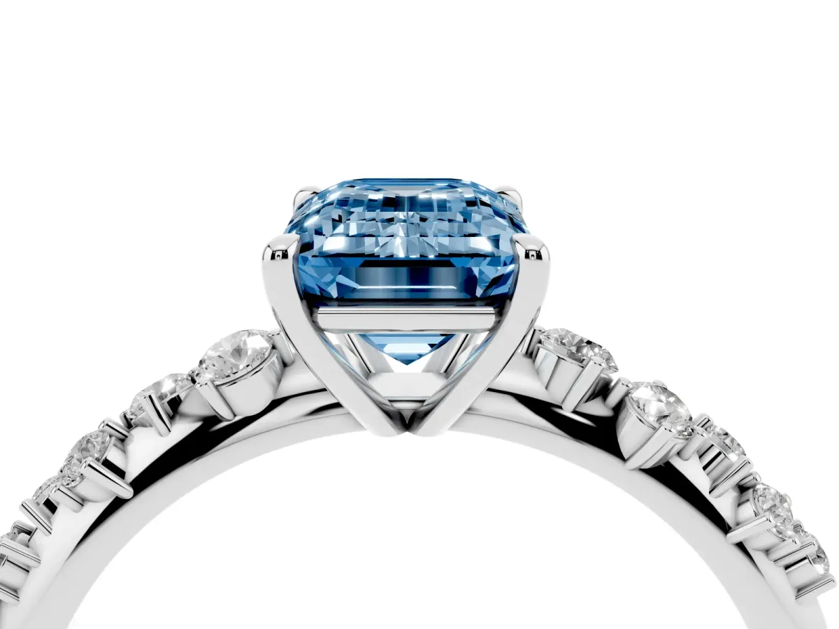 Fancy Blue Emerald Cut Diamond Cluster Side Stone Solitaire Ring with Prong Setting Platinum