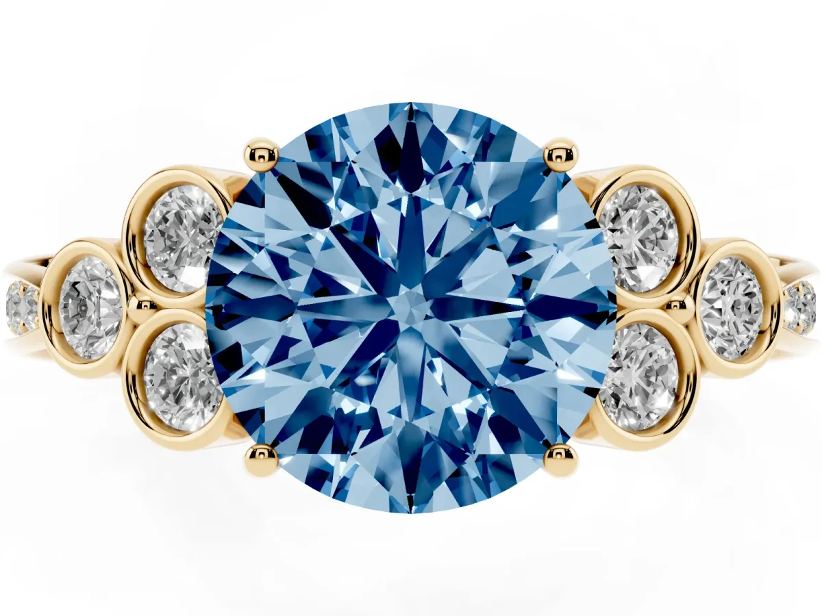 Fancy Blue Round Cut Cut Diamond Engagement Ring with Bezel Set Round Side Stones and Prong Setting Yellow gold