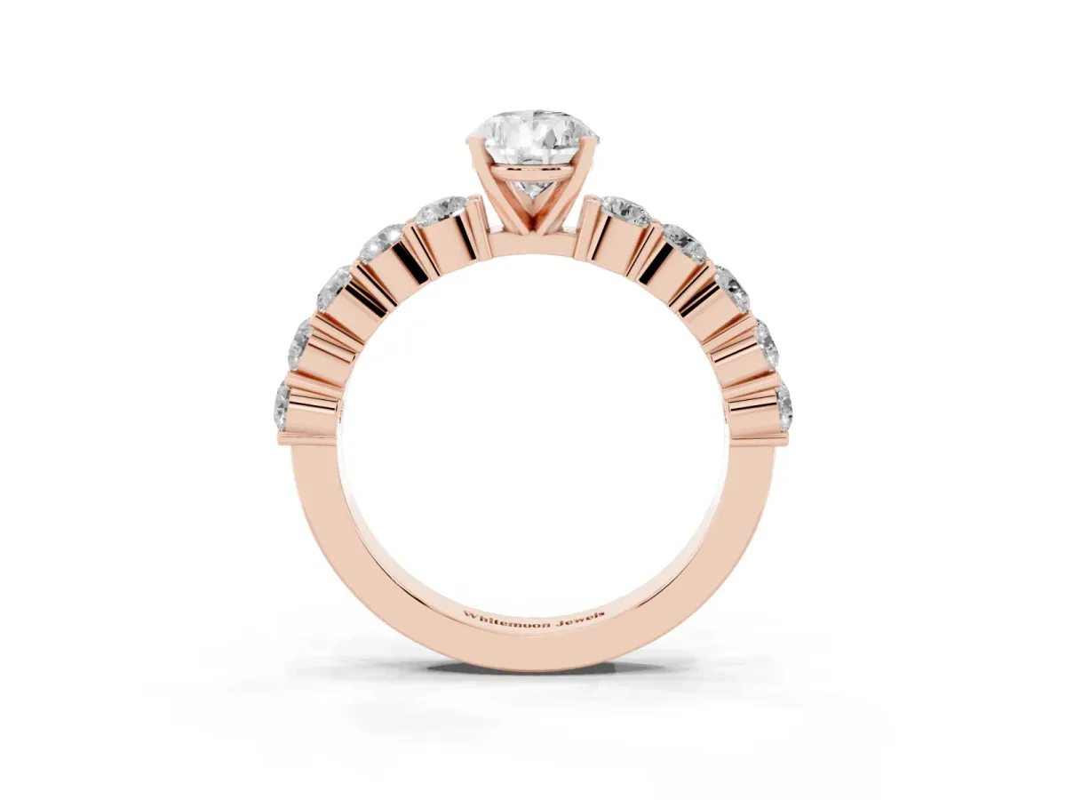 Pear Cut Diamond Solitaire Ring with Shared Prong Round Side Stones Rose gold