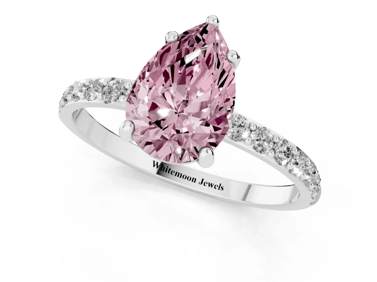Fancy Pink Pear Cut Diamond Solitaire Ring with Round Pavé Band and Prong Setting Platinum