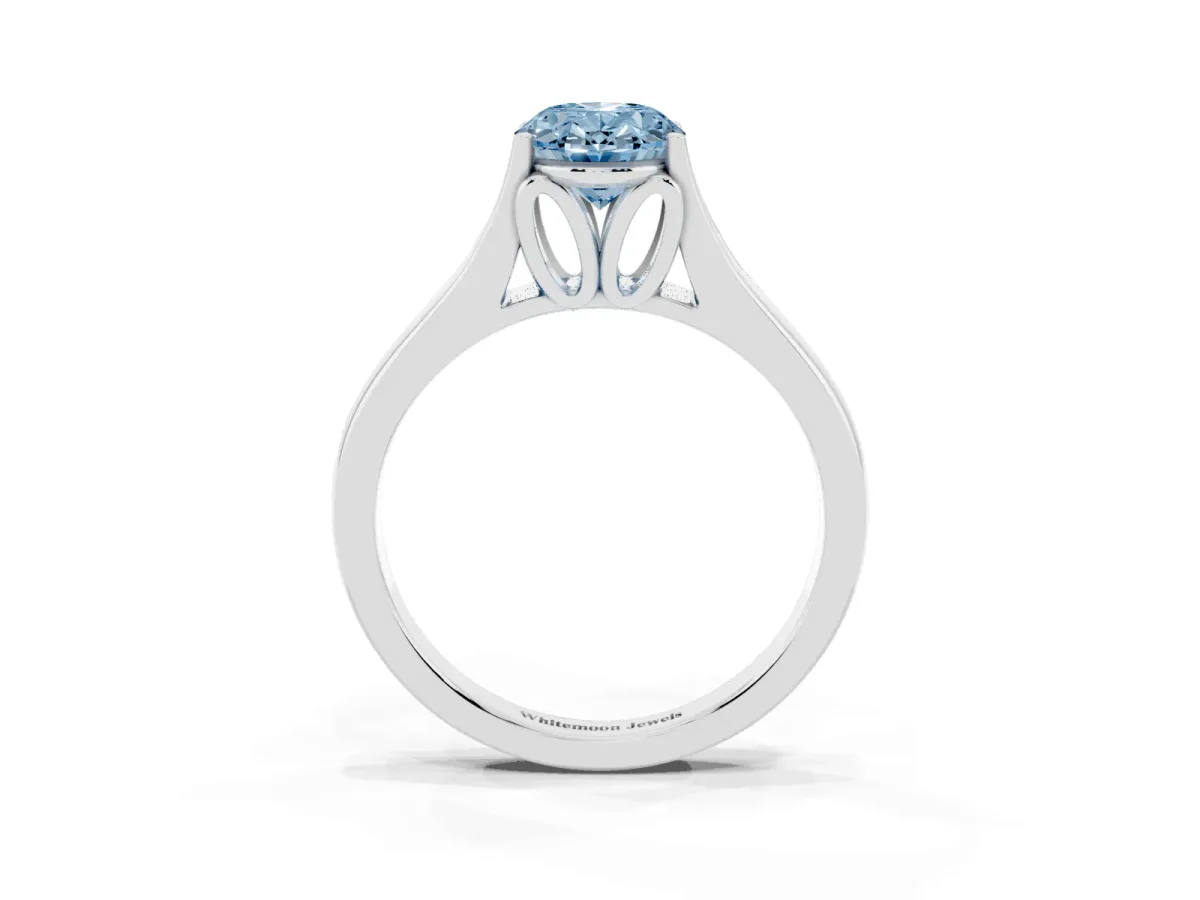 Fancy Blue Oval Cut Solitaire Diamond Ring with Cathedral Band and Four-Prong Setting Platinum