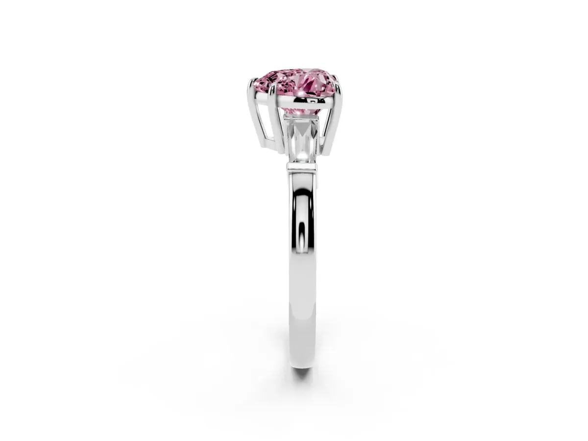 Fancy Pink Heart Cut Diamond Three-Stone Ring with Tapered Baguette Side Stones and Prong Setting Platinum