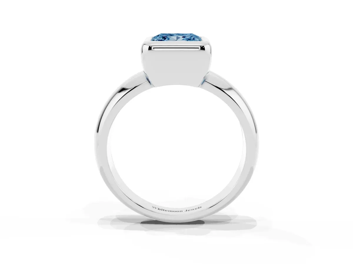 Fancy Blue Bezel Set Princess Cut Solitaire Ring with Wide Band Silver