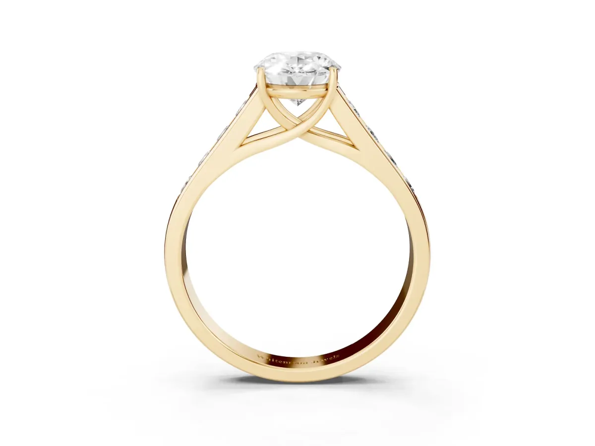 Oval Cut Brilliant Channel-Set Solitaire Ring with Four-Prong Setting Yellow gold