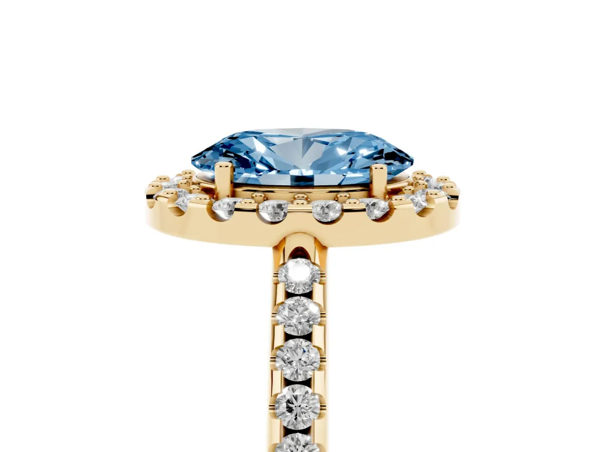 Fancy Blue Oval Cut Diamond Pavé Halo Ring with Four-Prong Setting Yellow gold