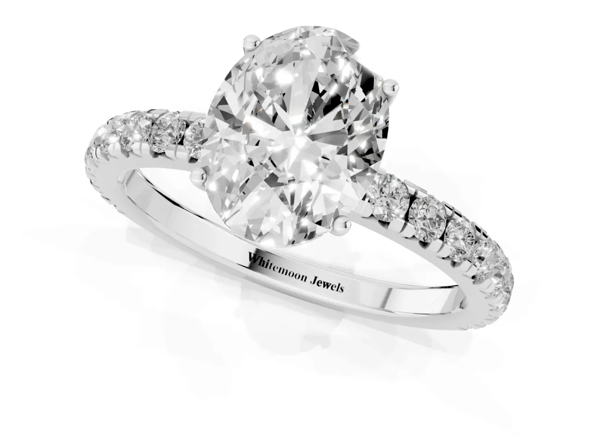 Oval Cut Diamond Pavé Solitaire Engagement Ring with Four-Prong Setting Platinum