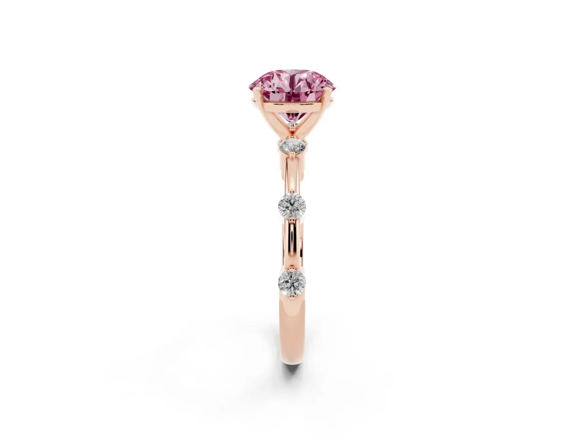 Fancy Pink Round Cut Solitaire Diamond Ring with Bezel Set Side Stones and Prong Setting Rose gold