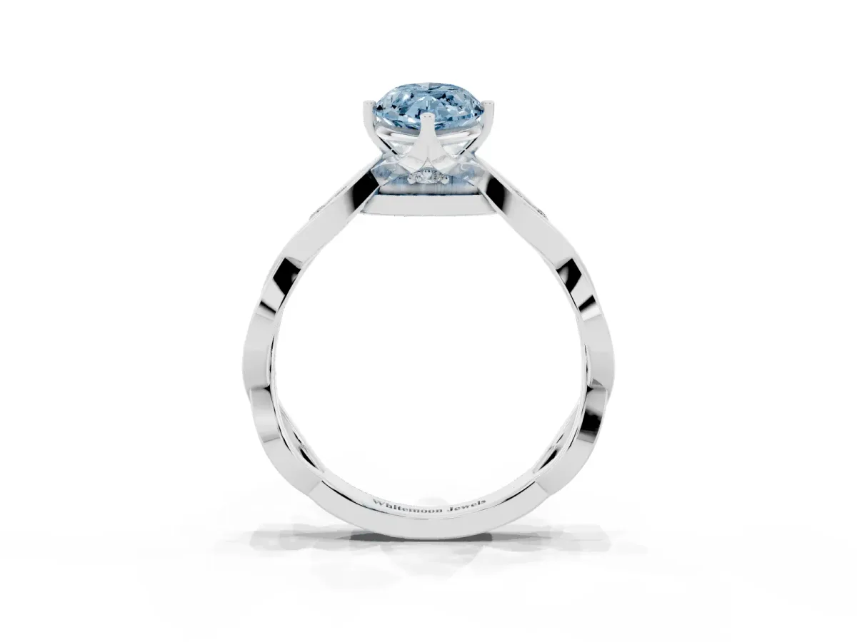 Fancy Blue Marquise Cut Solitaire Twist Band with Leaf Prong Setting Silver